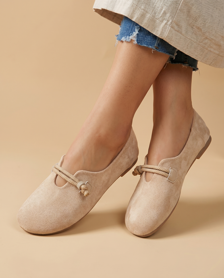 beige suede slip-on loafers, on foot