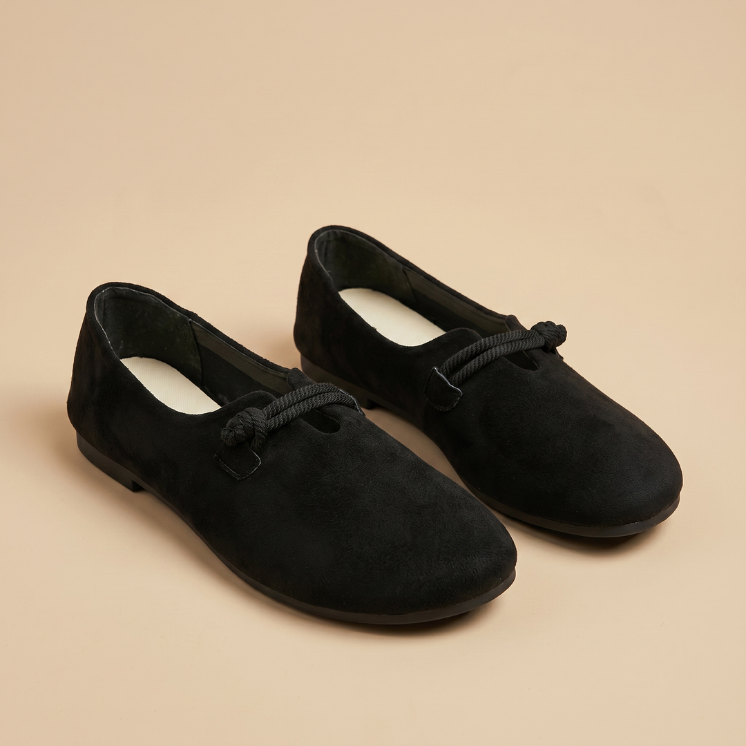 black suede slip-on loafers, pair