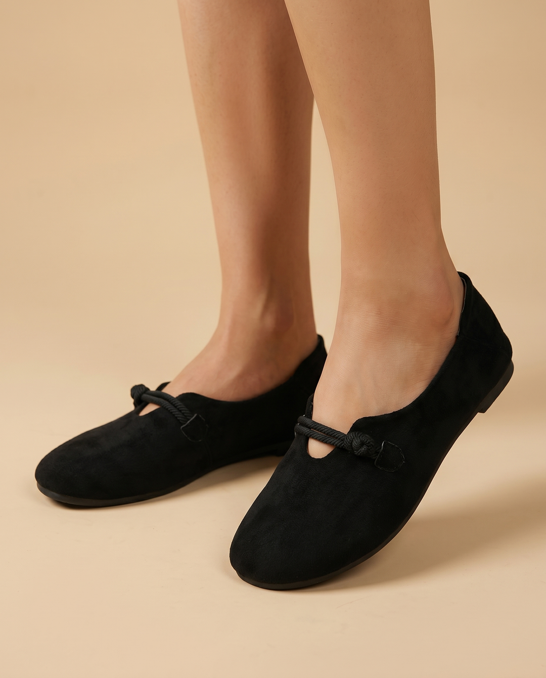 black suede slip-on loafers, on foot