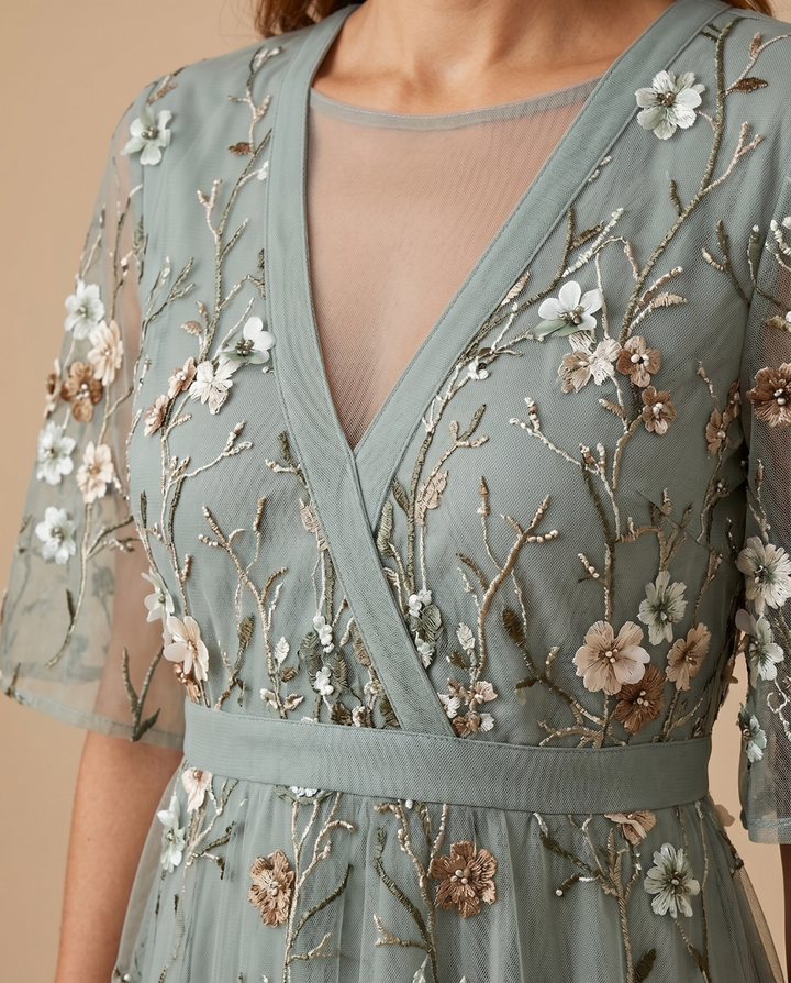 sage-green floral embroidery detail