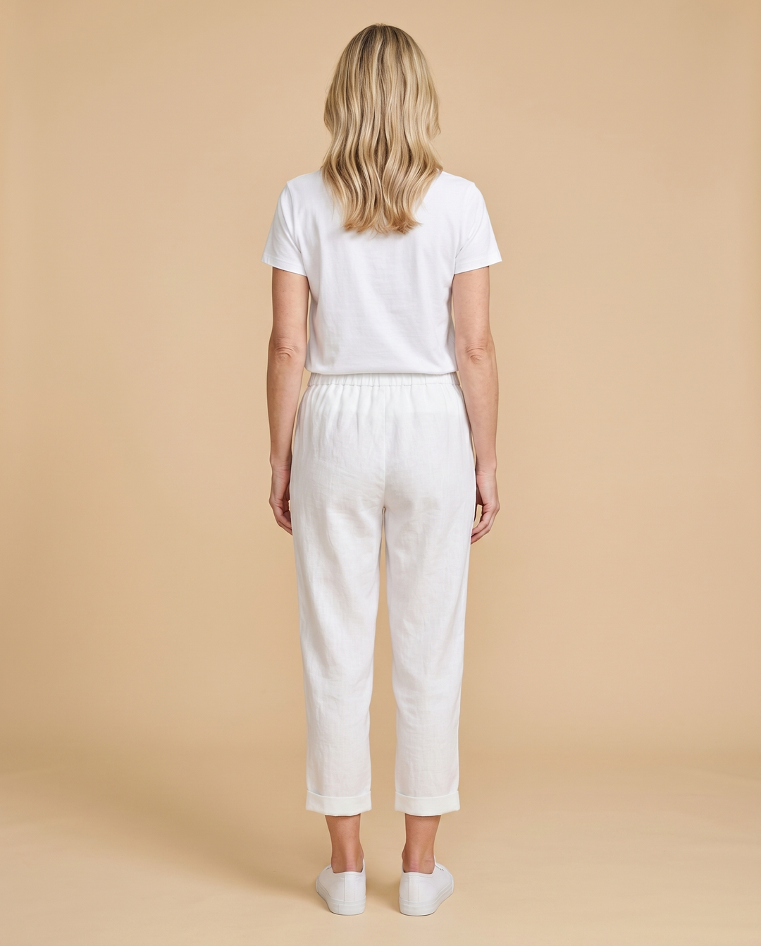 white linen tapered trousers back