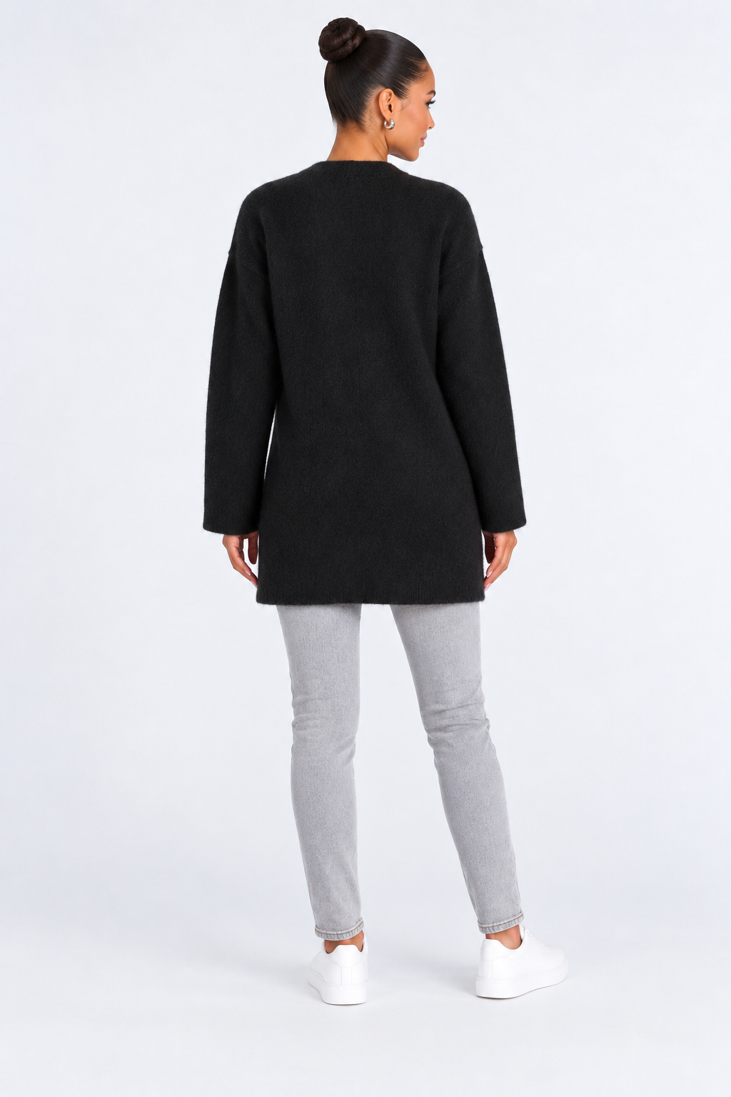 Elegant knitted cardigan — black-back studio view