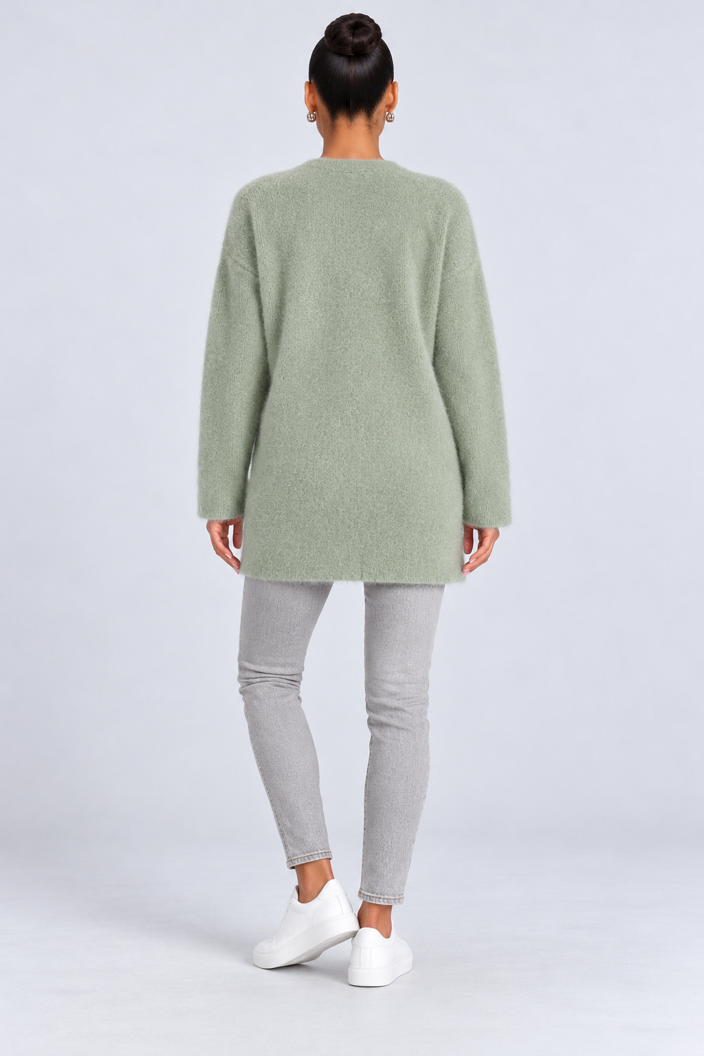 Elegant knitted cardigan — green-back studio view