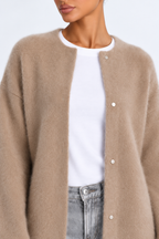 Elegant knitted cardigan — khaki-detail studio view