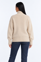 Knitted turtleneck — beige-back studio view